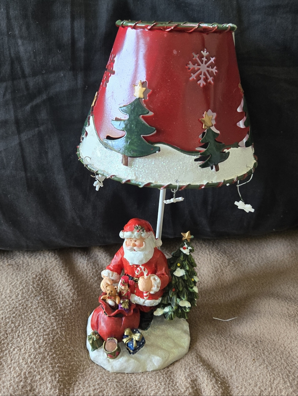 5'' x 9.5'' christmas tealight holder, santa putting gifts under tree